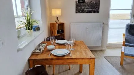 Wohnzimmer Ferienwohnung "Baltic Sunset" in 1. Reihe zum Ostseestrand