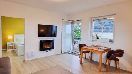 Wohnzimmer Ferienwohnung "Baltic Sunset" in 1. Reihe zum Ostseestrand