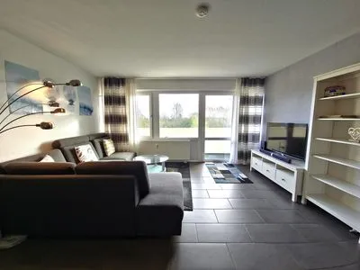 Wohnzimmer Ferienwohnung "Deichwind" in Holm an der Ostsee