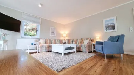 Wohnzimmer Ferienhaus "Küstenhuus" in Kalifornien an der Ostsee