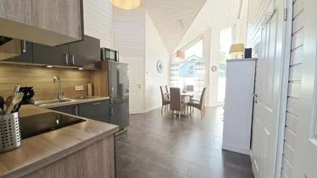 Wohnzimmer Ferienhaus "Lönneberga" im Ferienpark Holm an der Ostsee