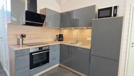 Küche / Küchenzeile Ferienhaus "Lönneberga" im Ferienpark Holm an der Ostsee