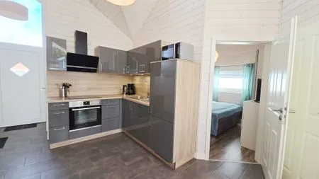 Küche / Küchenzeile Ferienhaus "Lönneberga" im Ferienpark Holm an der Ostsee