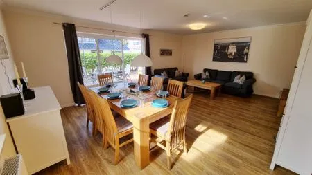 Wohnzimmer Ferienhaushälfte "Sandbank" Schönberger Strand an der Ostsee