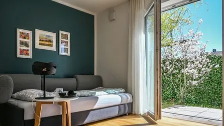 Wohnzimmer Apartment 7/7 OG - überdachter Balkon