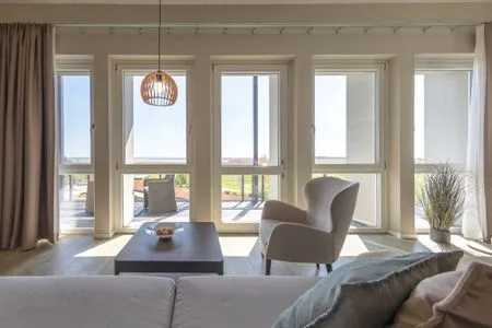 Ferienwohnung Sonnengott in Wustrow - offener Wohnbereich mit Zugang zum Balkon  Sonnengott