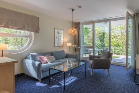 Ferienwohnung Grasnelke in Zingst Wohnbereich mit Zugang zum Balkon  Grasnelke