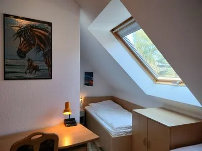 Schlafzimmer mit Einzelbetten Am Deich Am Deich Haus 26
