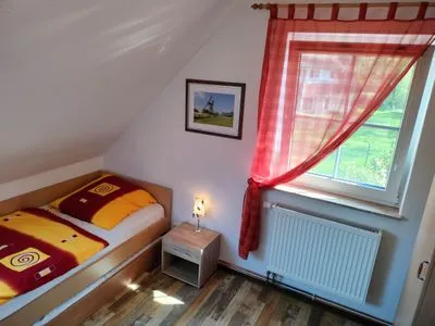 Schlafzimmer mit Einzelbetten Am Deich Am Deich Haus 26