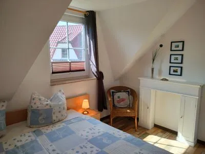 Schlafzimmer mit Doppelbett Am Deich Am Deich Haus 26