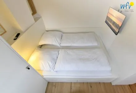 Schlafzimmer Haus am Dorfbrunnen Ferienwohnung Strandfloh