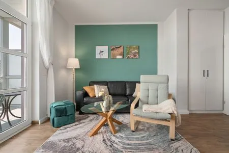 Ferienwohnung Müritzloge Waren (Müritz) - mit stilvoll eingerichteten Wohnzimmer  Müritzloge