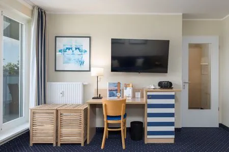 Ferienwohnung Seestern Zingst Wohnzimmer mit TV  Seestern