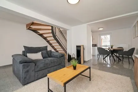 Seehus Malchow Wohnzimmer mit Wendeltreppe  Seehus