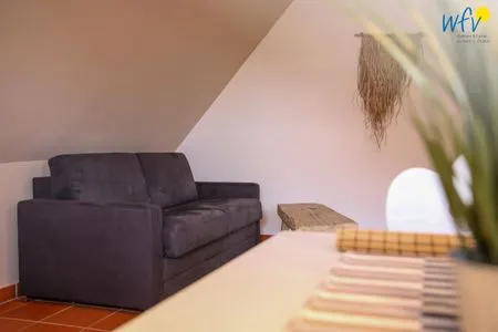 Wohnzimmer Ferienhaus am Gutspark Dranske Ferienwohnung Sonnenmorgen