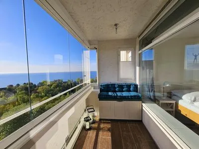 Genießen Sie unvergessliche Momente auf dem Balkon mit atemberaubendem Meerblick. Panoramic Sierksdorf Bayview