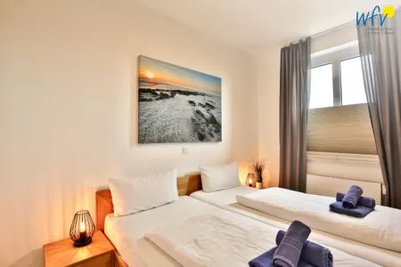 Schlafzimmer Haus Dünenblick Ferienwohnung 6