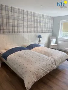 Schlafzimmer Ferienhaus Greune-Stee-Weg 39 Ferienwohnung Südstrandflair