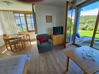 Wohnzimmer Ferienland Sonnenwald Appartement Waldsonne