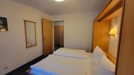 Schlafzimmer Wohnung 22 im Haus Hühnergott