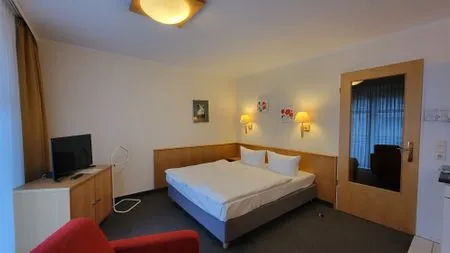 Schlafzimmer Wohnung 8 im Haus Hühnergott
