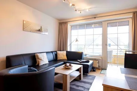 Wohnzimmer (DKK11) Ferienwohnung Strandburg