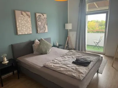 Schlafzimmer Gemütliches Appartement "Martin" in Halle mit 3 Schlafzimmern und Stellplatz