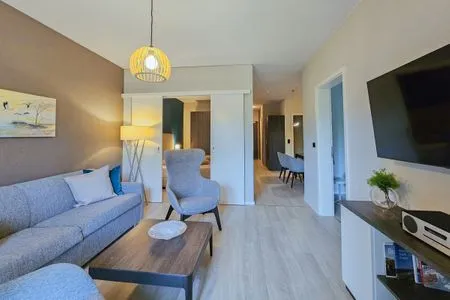 Ferienwohnung Kroonkieker Ostseebad Wustrow - ZweiWasser Alte Seefahrtschule Wohnzimmer mit TV  Kroonkieker