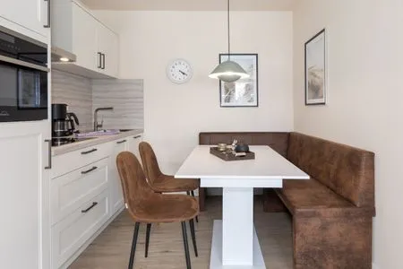 Ferienwohnung Küstenglück Aparthotel Zingst - Moderner Essbereich  Küstenglück