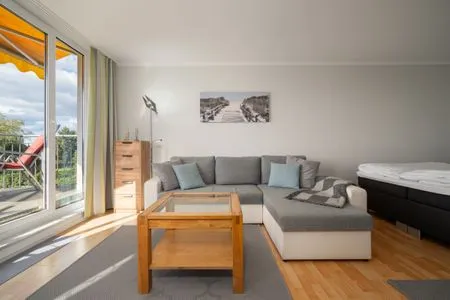 Ferienwohnung Seepferdchen Waren (Müritz) - Wohnzimmer mit Balkon Zugang  Seepferdchen