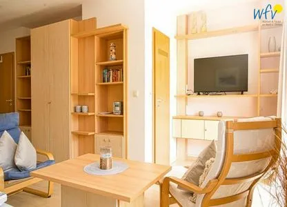 Wohnzimmer Ferienhäuser Jadehörn Ferienwohnung Sandfloh