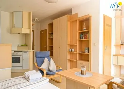 Wohnzimmer Ferienhäuser Jadehörn Ferienwohnung Sandfloh