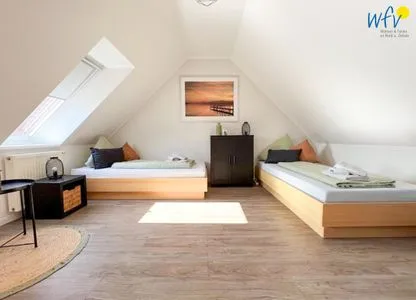Schlafzimmer Ferienhäuser Jadehörn Ferienwohnungen Sandfloh + Sonnenstern