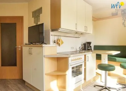 Küche / Küchenzeile Ferienhäuser Jadehörn Ferienwohnungen Sandfloh + Sonnenstern