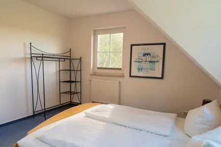 Schlafzimmer mit Doppelbett Am Deich Am Deich Haus 36