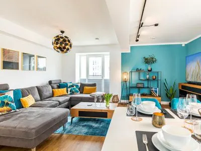 Wohnzimmer: Schlafsofa, TV FeWo Baltic Sunset in PRORA - 3.34