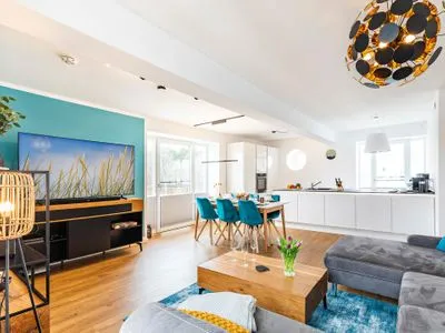 Wohnzimmer: Schlafsofa, TV FeWo Baltic Sunset in PRORA - 3.34