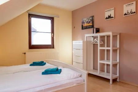4. Schlafzimmer mit Doppelbett  Haus Zeitlos