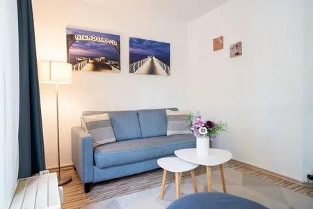 Wohnzimmer (Ost11a) "Ferienwohnung Strandnah"