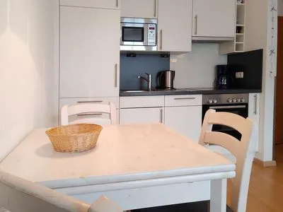 offene Küche in der Ferienwohnung Auszeit am Meer in Wittdün auf Amrum Haus *Südspitze 17* Ferienwohnung *Auszeit am Meer*