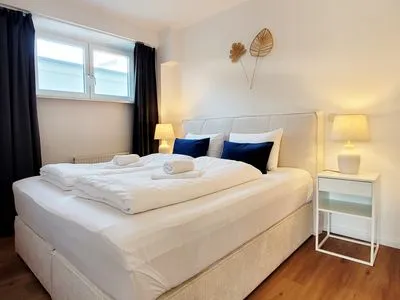 Hochwertiges Bockspring-Doppelbett 180x200 cm Gemütliche Ferienwohnung mit Meerblick und Terrasse - Nur 50 Meter zum Strand inkl. Parkplatz und Fahrradunterstellplatz