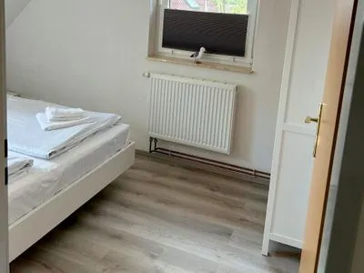 Schlafzimmer mit Doppelbett Am Deich Am Deich Haus 18