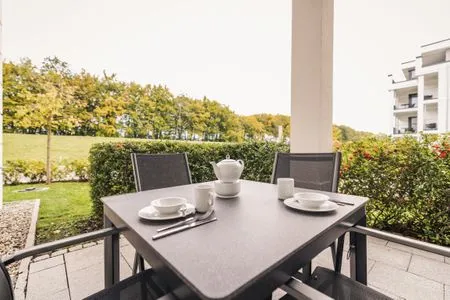 Terrasse mit Blick zum Deich Logierhaus Friedrich WE 2 - "Strandrose"