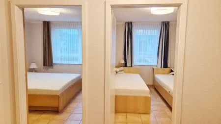 Blick in die beiden Schlafzimmer Residenz am Strand Wohnung 4-61