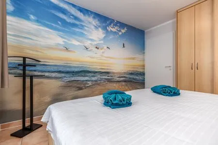 Schlafzimmer mit Doppelbett Residenz am Strand Wohnung 4-61