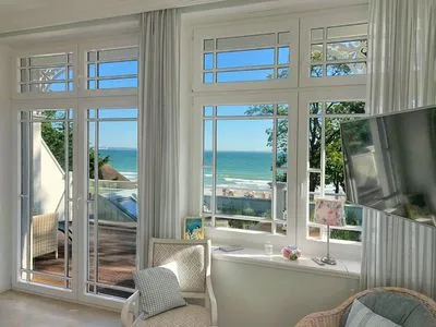 Wohnzimmer Villa Svanen App. 2 - Frühstücken mit Blick aufs Meer - Urlaub mit einzigartigem Meerblick