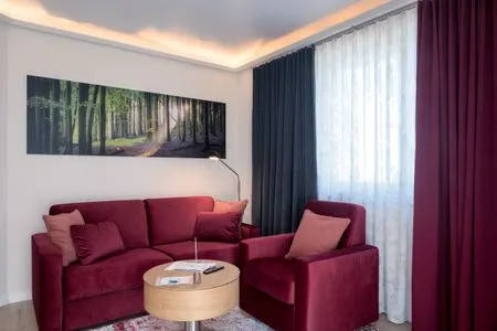 Wohnzimmer Villa Nause, Ferienwohnung Buchenfreund mit Spa und Freizeit