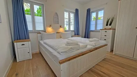 Schlafzimmer Villa Küstenperle, App. Leuchtfeuer - Meerblick pur!