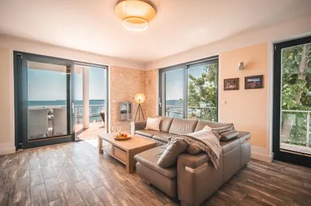 Wohnzimmer Villa Friede-Marie, App. Ostseeweitblick - mit traumhaften Meerblick