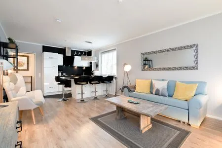 Wohnzimmer Ferienwohnung "StrandPause 52"